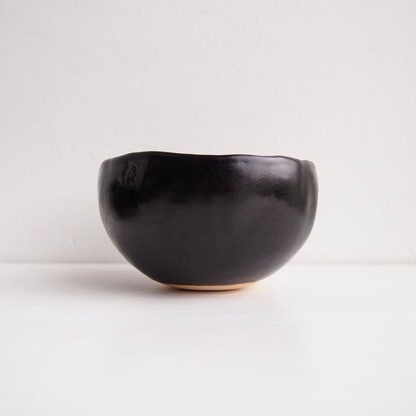 Handmade black cherry pottery tea bowl