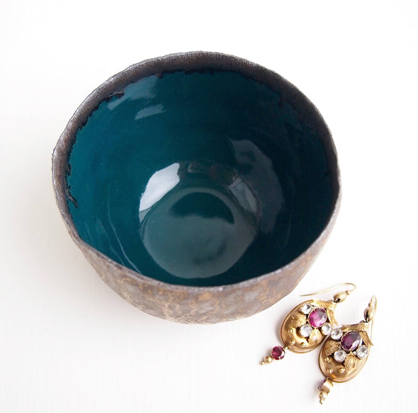 inside of Teal and gold ceramic ring bowl