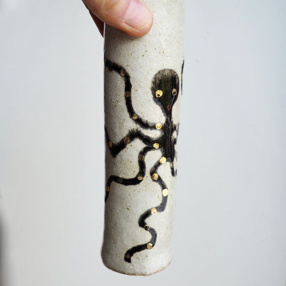 Handmade pottery octopus cylinder vases with gold lustre.