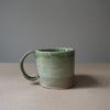 Celadon green stripy ceramic mug