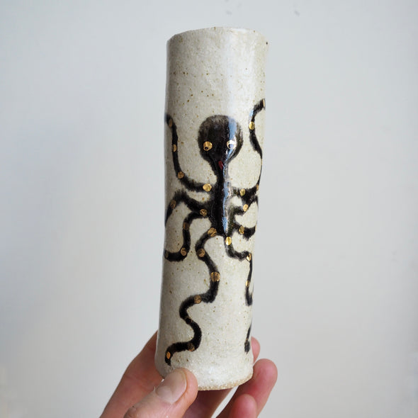 Handmade pottery octopus cylinder vases with gold lustre.