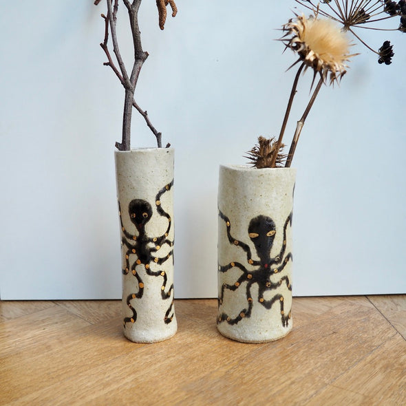 Handmade pottery octopus cylinder vases with gold lustre.