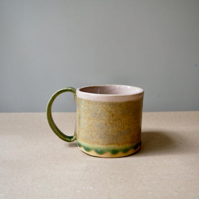 Ceramic mug with pink and green textural glaze