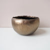 Handmade gold  ceramic ring bowl with swirly dripped glaze