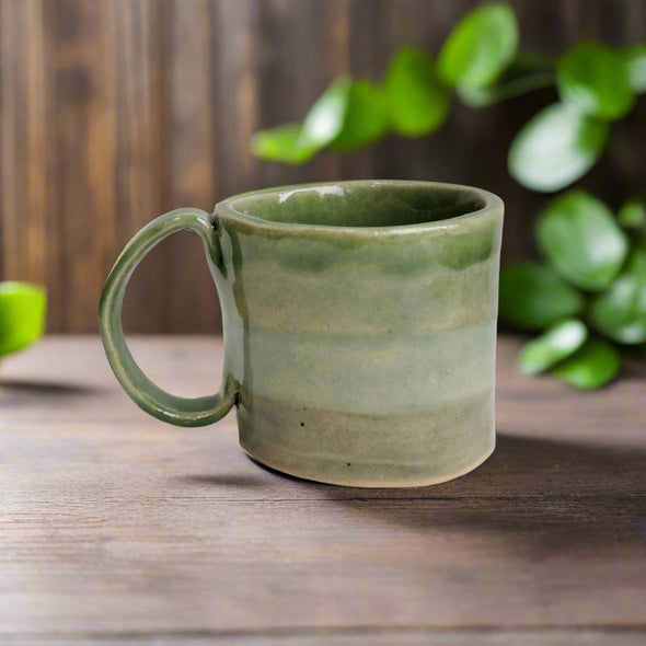 Celadon green stripy ceramic mug