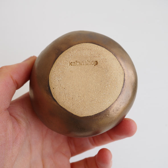 Handmade ceramic round vases in white , gold & black