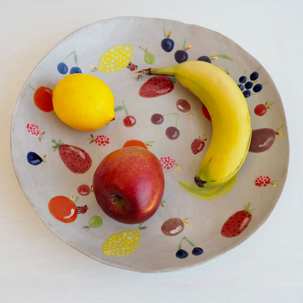 Handmade large ceramic fruit bowl with illustrated fruits