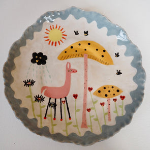 Handmade illustrated plate with pink Llama, toadstools , hearts , sun and clouds