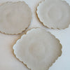 Ceramic oatmeal satin scalloped edge plates