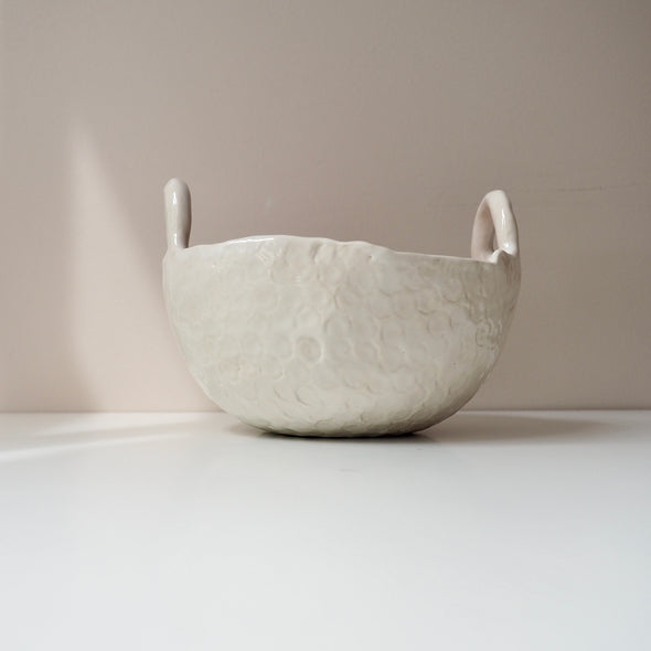 Handmade pastel pink and white ceramic bowl with handles