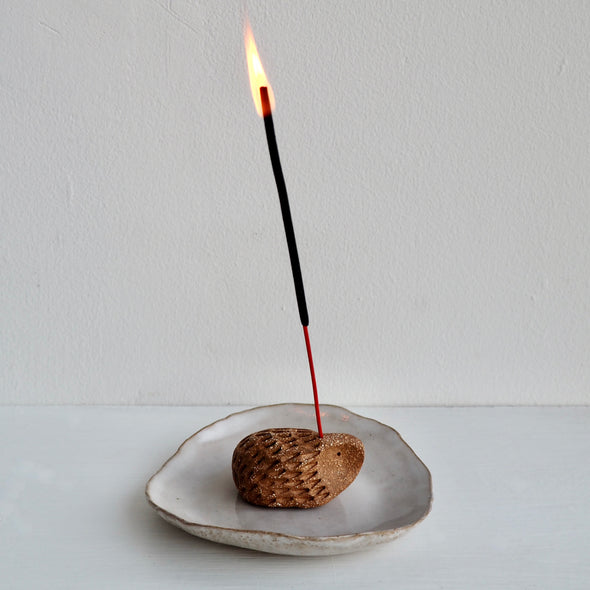 Pottery hedgehog incense holders