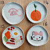 Handmade little ceramic  illustrated  ring dishes inspired by Japan.