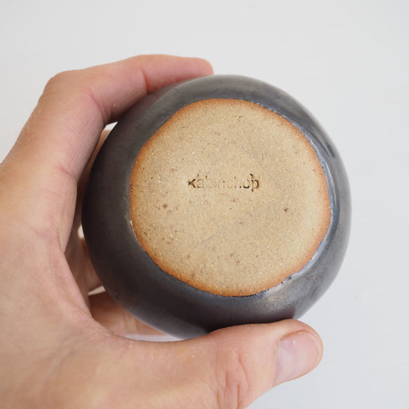 Handmade ceramic round vases in white , gold & black