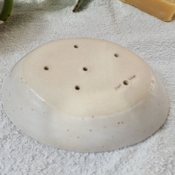 Handmade yellow speckled oval pottery soap dish