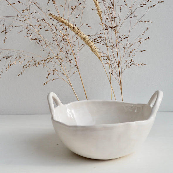  white ceramic bowl with handles