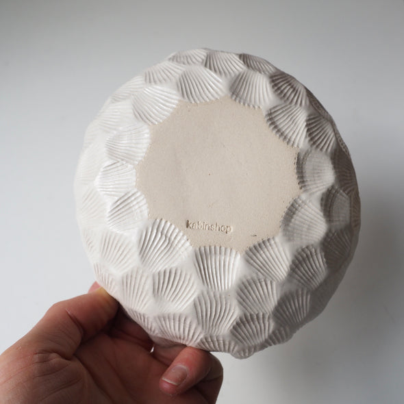 satin white shell textured ceramic bowl underside