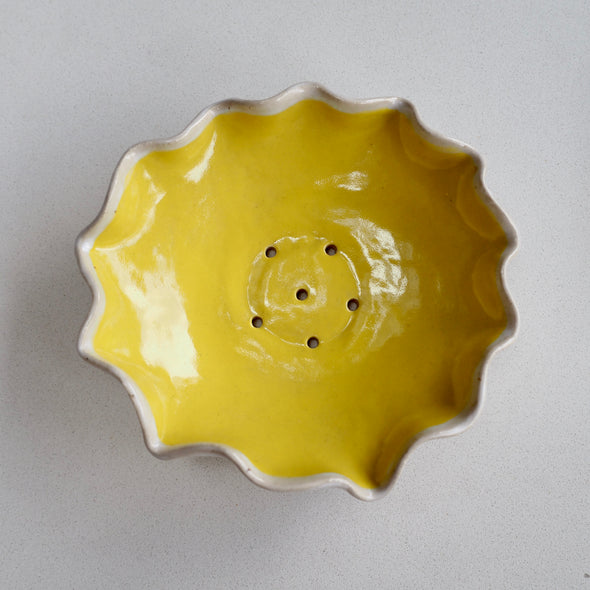 Yellow ceramic soap dish