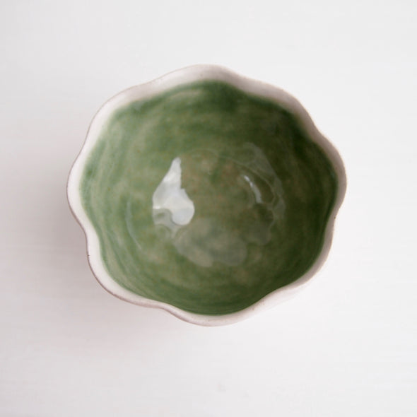 Handmade green and satin white ceramic ring dish with a cylinder base