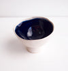 Handmade navy and satin white ceramic ring dish with a cylinder base