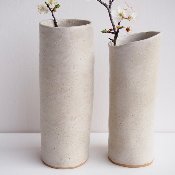 Handmade satin oatmeal pottery cylinder vase.