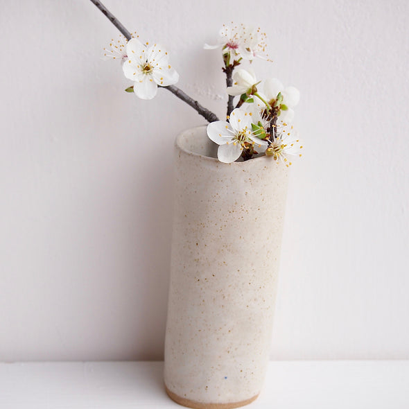 Handmade satin oatmeal pottery cylinder vase.