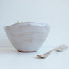 side view oatmeal gloss bowl with spoon