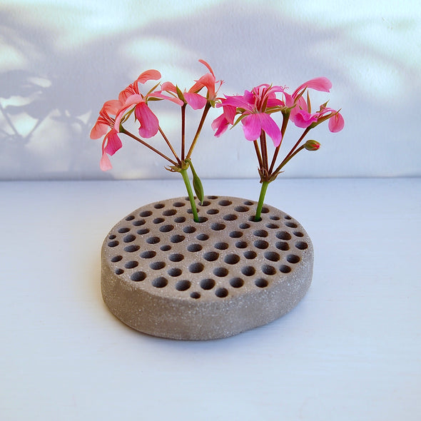 Handmade grey ceramic flower arrangement frog