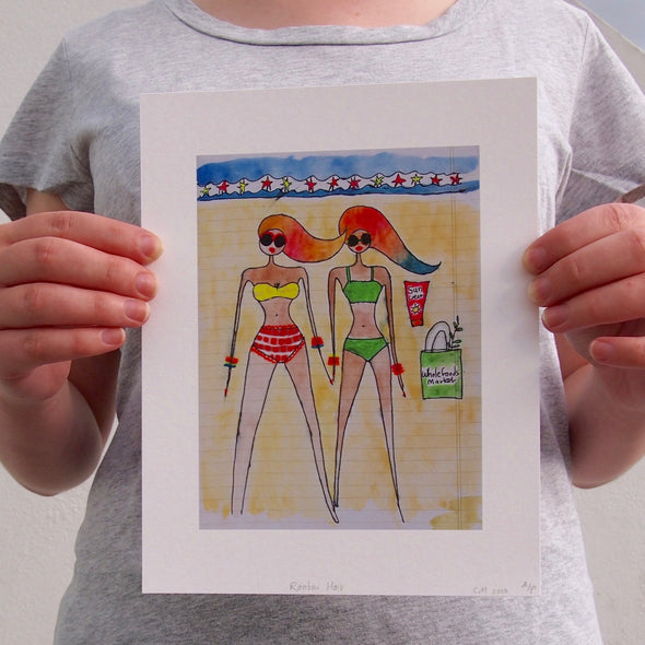 Giclee print of 2 girls on the beach with rainbow hair.