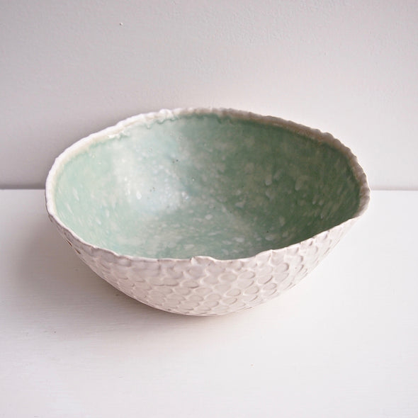 turquoise and white pottery fruit bowl