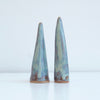 2 small blue/brown ceramic ring cones