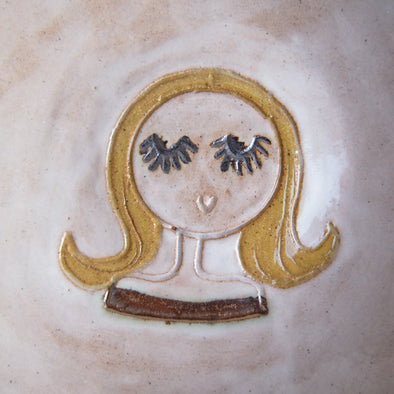 Girl with blonde bob hair mini pottery face plate.