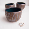 Teal and gold pottery ring bowls