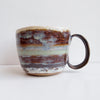 handmade brown, blue, turquoise and gold mug