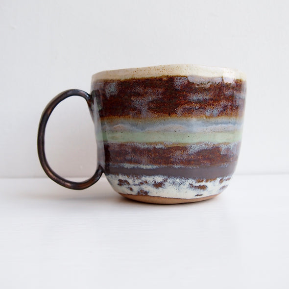 handmade brown, blue, turquoise and gold mug