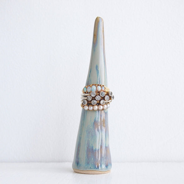 One blue brown ceramic ring cone with rings