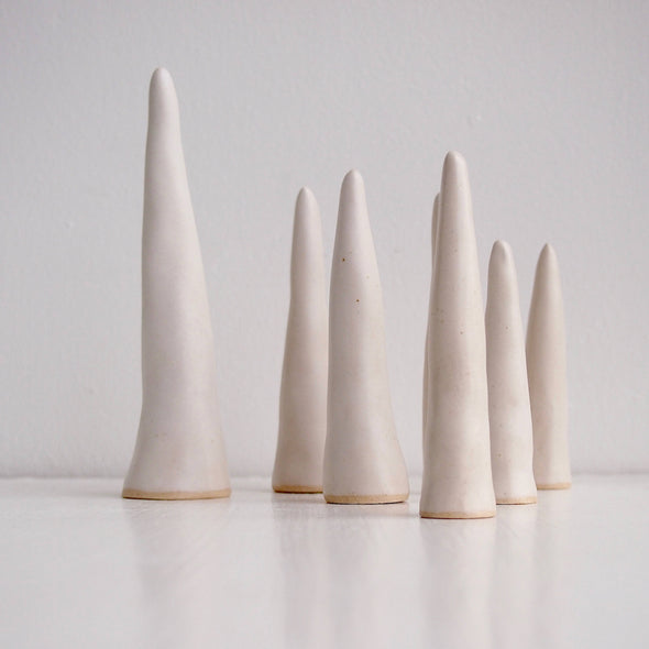 Group of Satin white pottery ring cones
