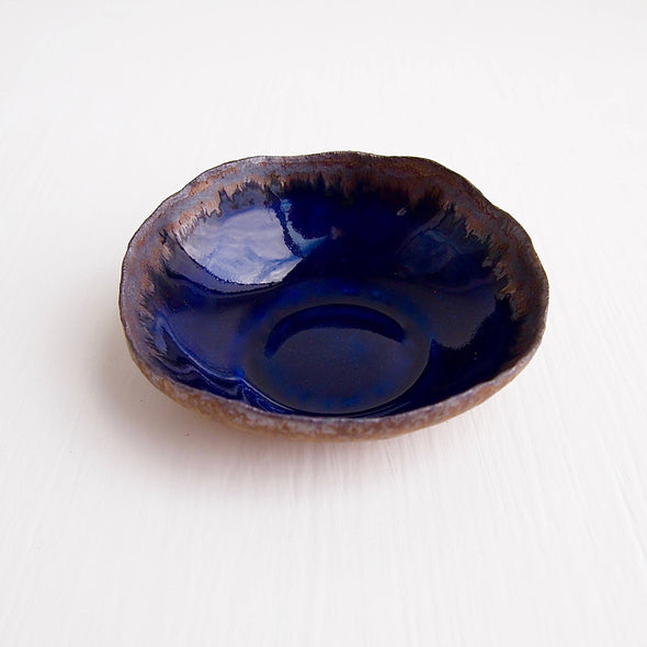 Handmade gold and navy blue ceramic ring dish,