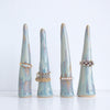 Line of blue brown ceramic ring cones