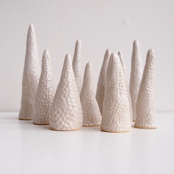 Group of white ceramic circle texture ring cones