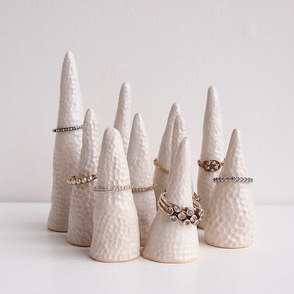 Group of white ceramic circle texture ring cones with rings