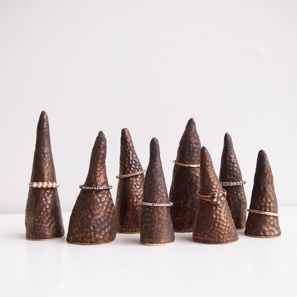 Handmade black/gold textural ceramic ring cones