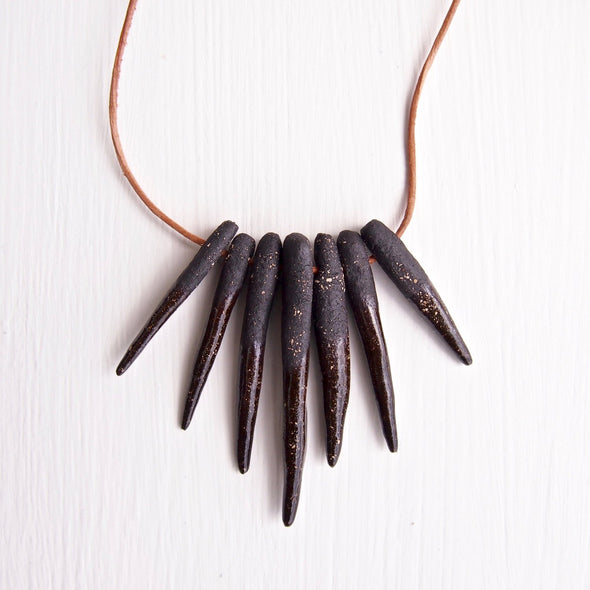 Black ceramic arrowhead necklace