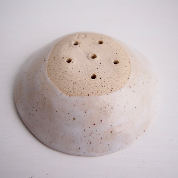 underside cream speckled mini pottery soap dish