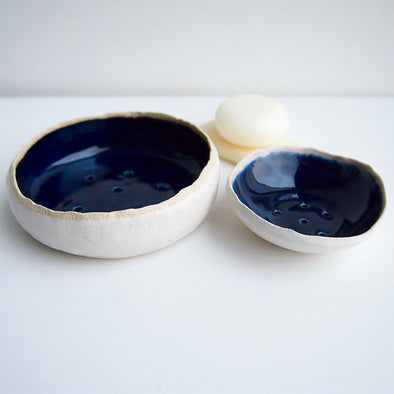 navy and white pottery soap dishes