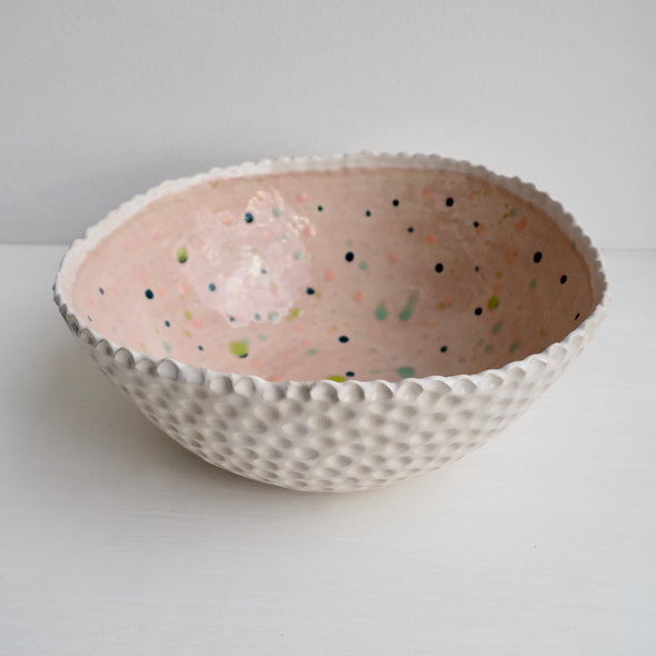 Handmade pastel pink circle texture  ceramic fruit bowl with splatter pattern
