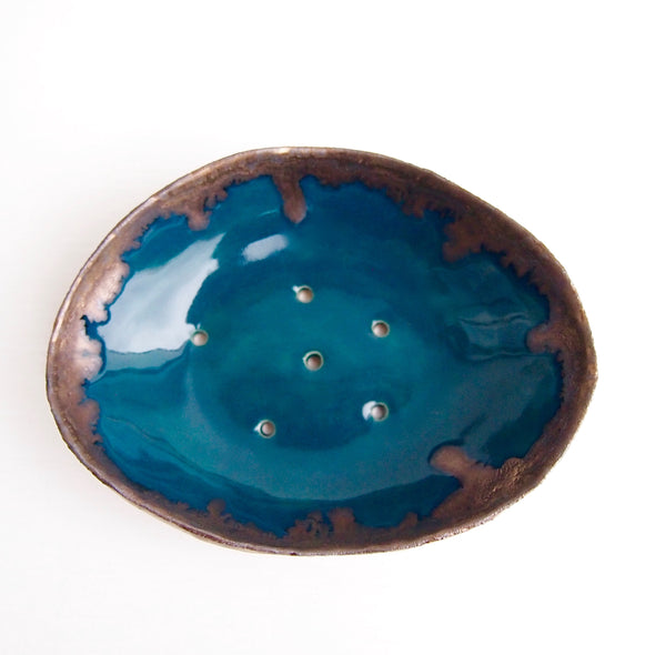 teal and gold ceramic oval soap dish top view