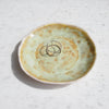 yellow pottery ring dish with ring